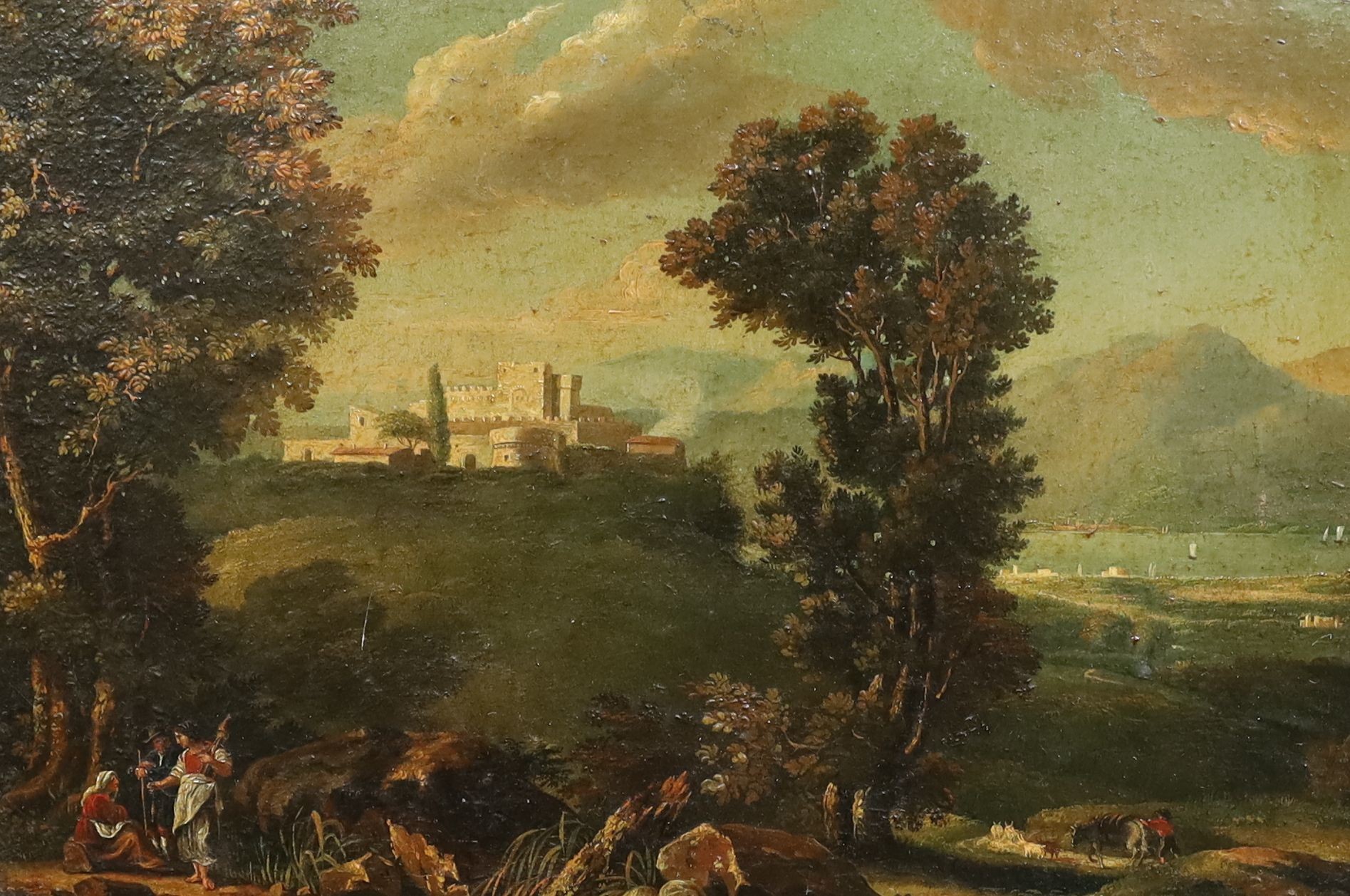 Early 19th century Italian School, Figures in a landscape with castle beyond, oil on canvas, 24 x 34.5cm
